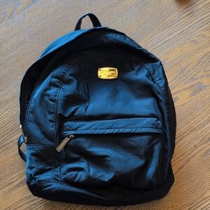 Michael Kors Jet Black Backpack with Gold Accents